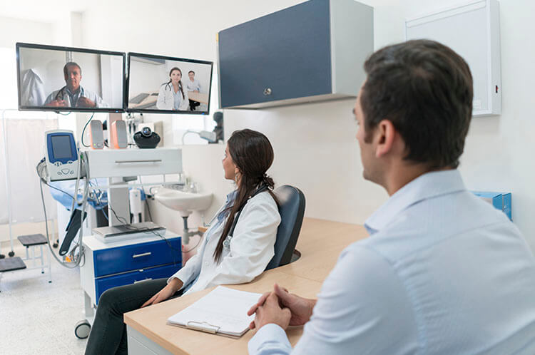 doctors in a video conference in a hospital setting/telemedicine