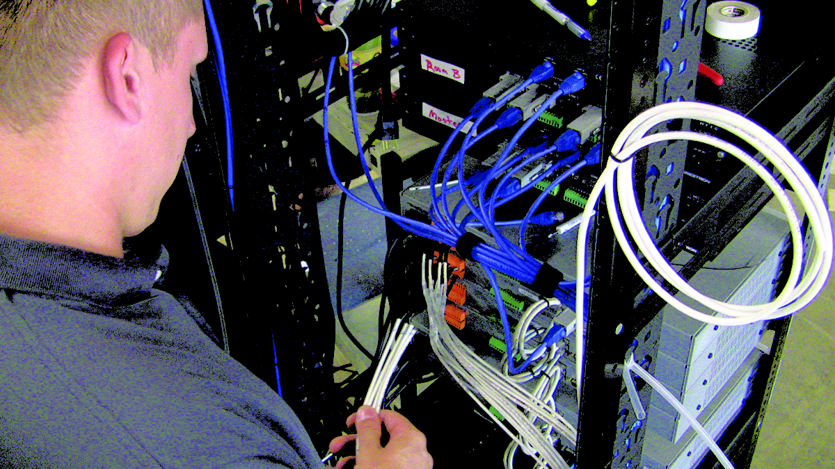 technician updating a system's IT services