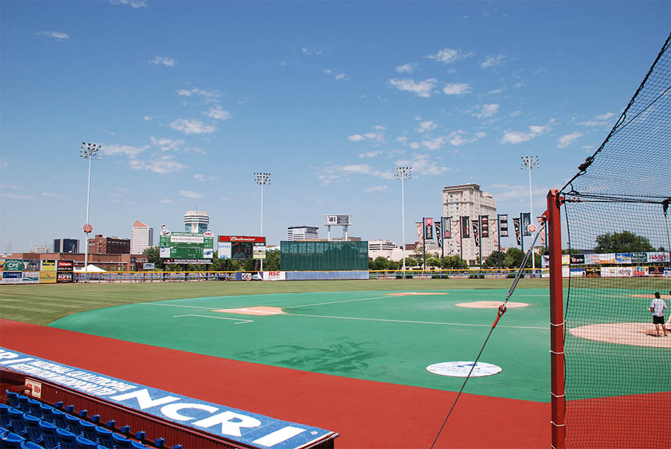 view from behind the dugout at a baseball stadium