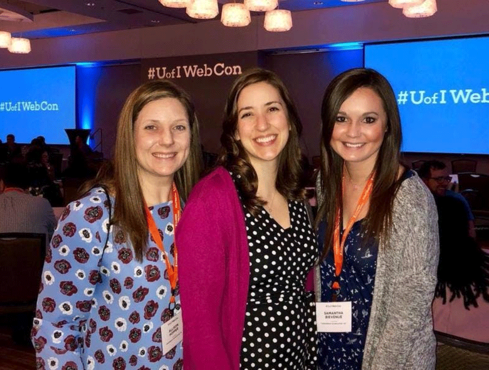 three CTI employees at a conference