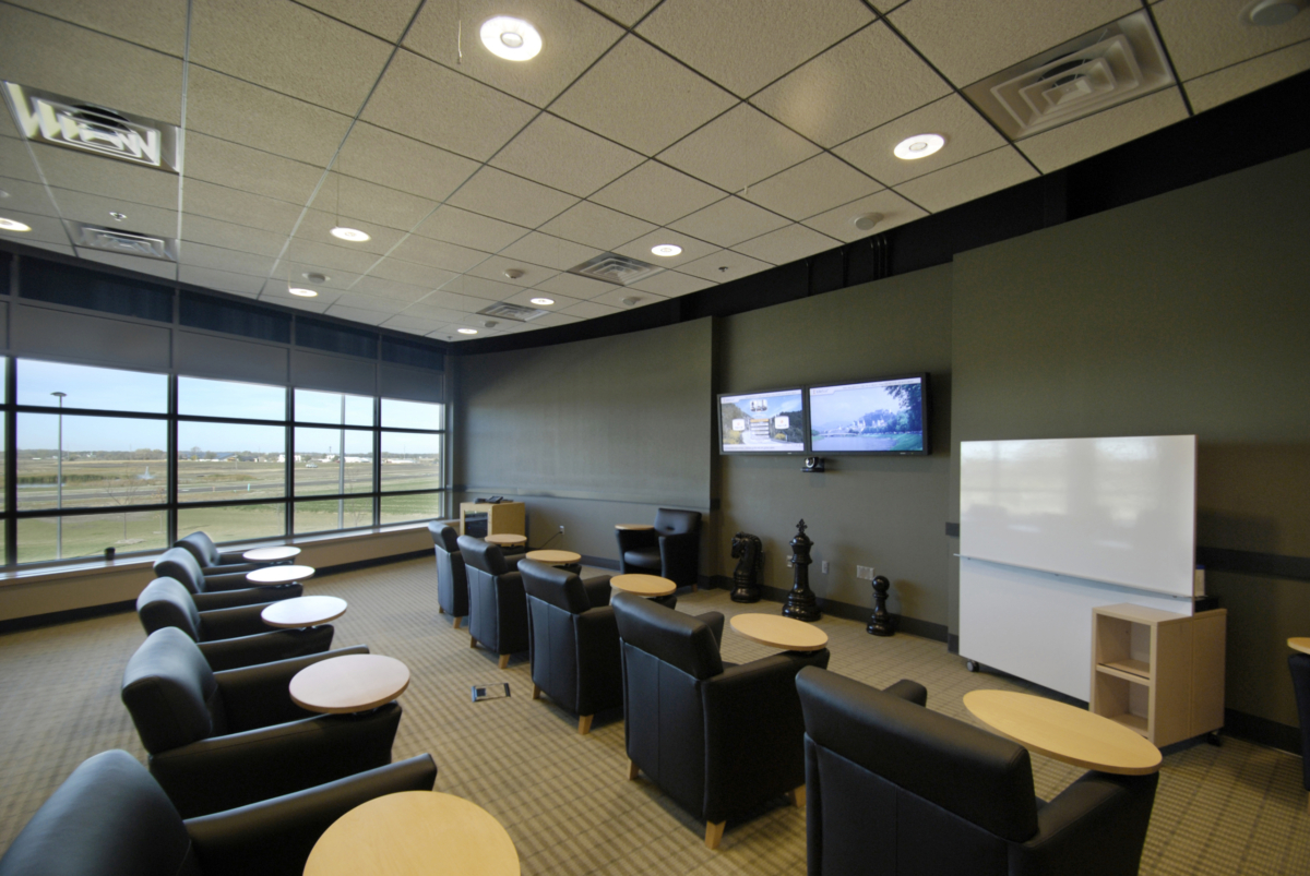college classroom with mounted displays make for optimal higher education technology