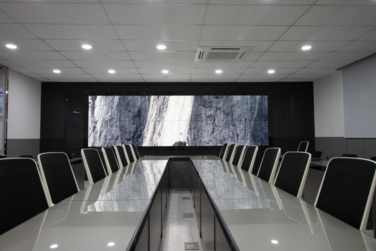 futuristic meeting room with large video wall