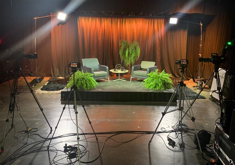 cameras, lighting, and stage for a digital production