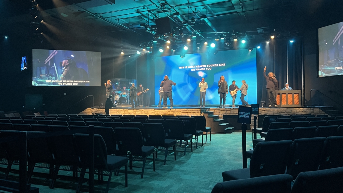 panoramic view of stage lit by LED video wall
