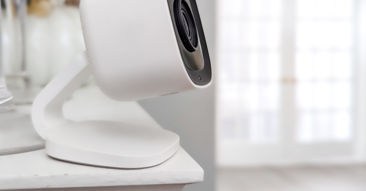 white desktop camera on a table