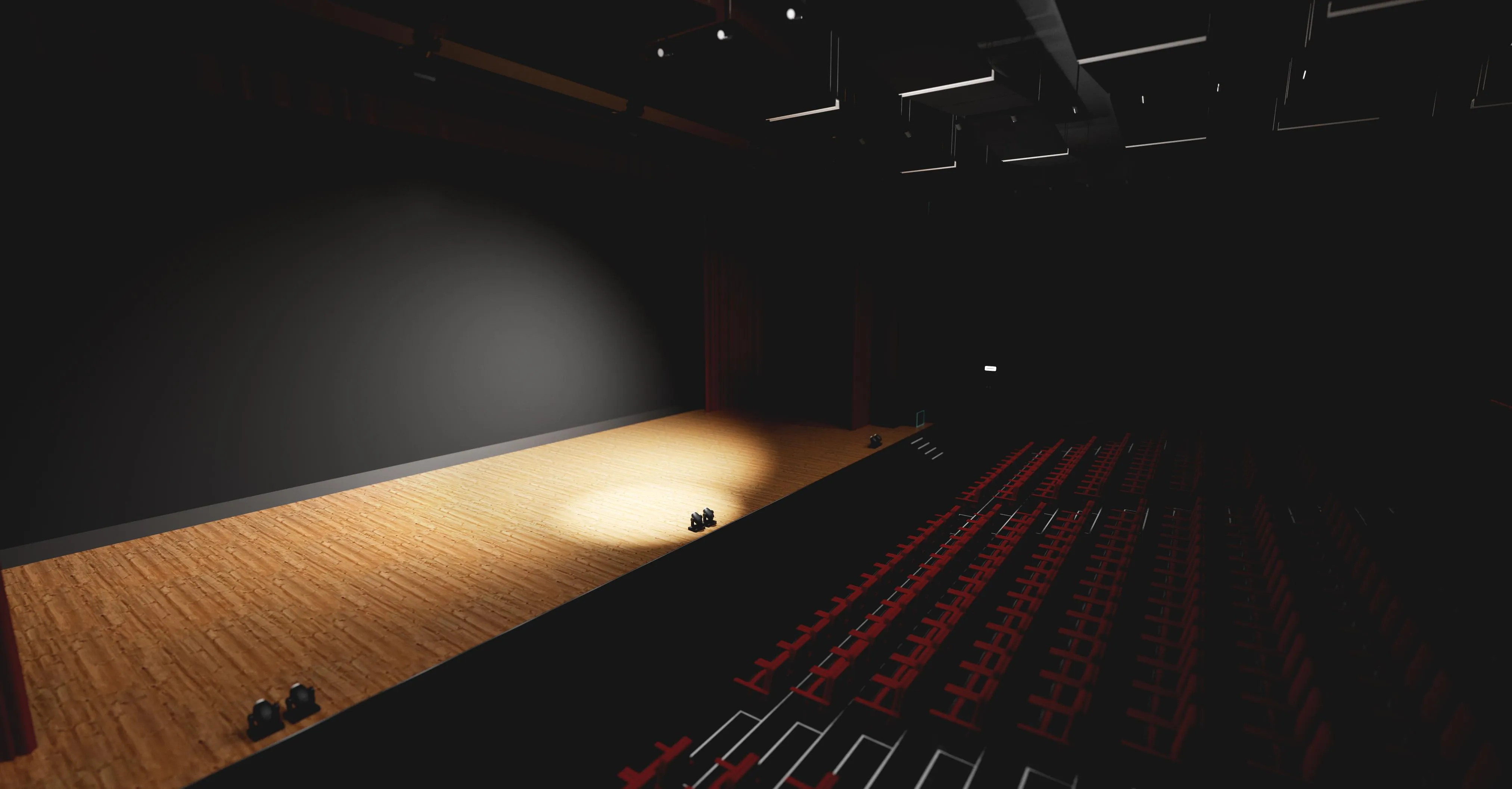 Spotlighted empty theatre stage with wooden floor and seating