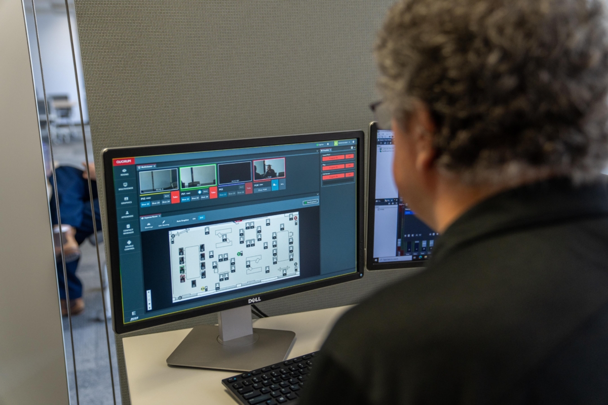 Man working on Quorum on his deskptop