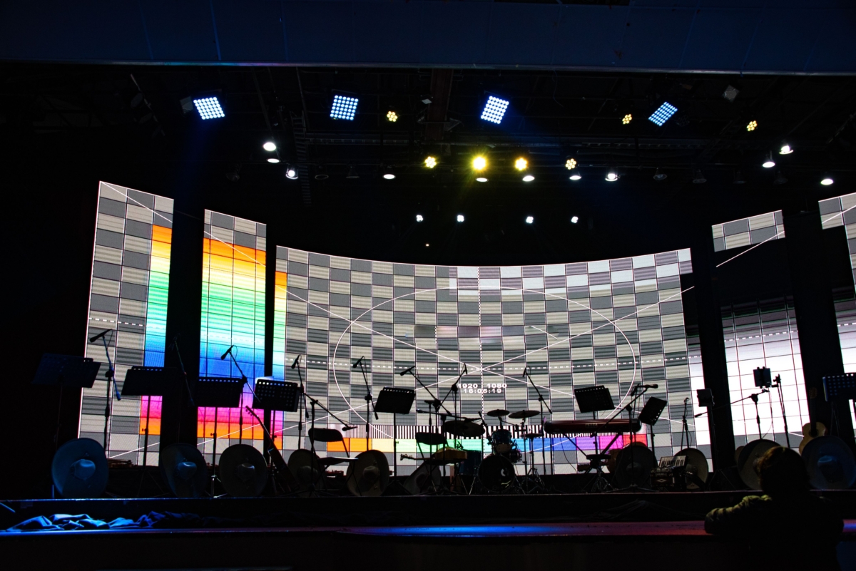 mariachi musical stage with lights hats and instruments