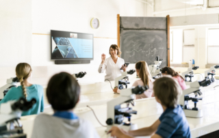 People seeing a screen in conference room