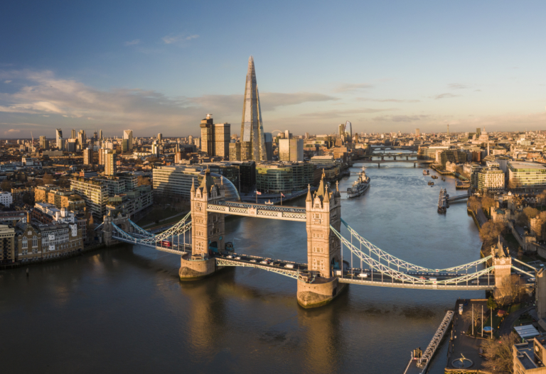 UK, London, Aerial view of Tower Bridge over River Thames at sunset